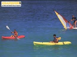 CANOE SPORT IN THE BEACH